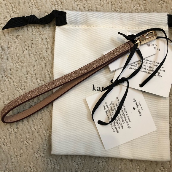 Kate spade glitter wrist strap rose gold
